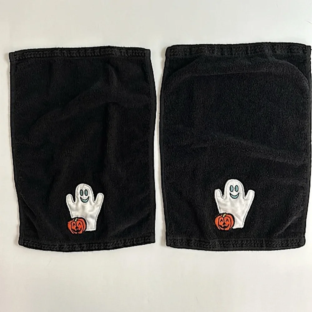 Halloween hand towels with a friendly ghost and pumpkin appliqué